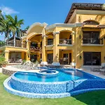 Mediterranean-Style Flamingo Mansion Offers The Ultimate In Beachfront Luxury