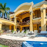 Mediterranean-Style Flamingo Mansion Offers The Ultimate In Beachfront Luxury