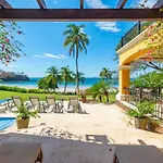Mediterranean-Style Flamingo Mansion Offers The Ultimate In Beachfront Luxury